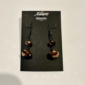 Allure Prism cut dangle earrings.